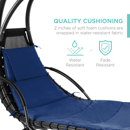 Hanging curved steel chaise lounge swing with canopy and pillow, navy blue.