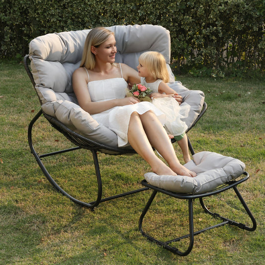 Wisteria Lane rocking egg chair with ottoman, cushioned wicker lounge for indoor/outdoor, light grey.